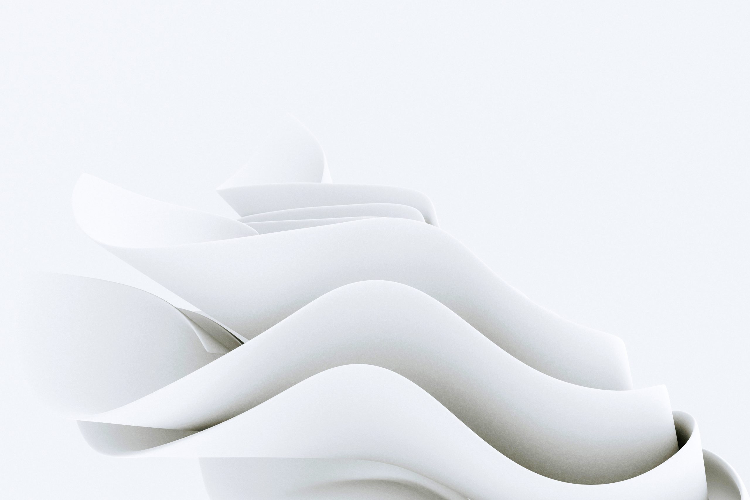 a white object with wavy shapes. Image by Pawel Czerwinski on Unsplash a white object with wavy shapes on a gray background
